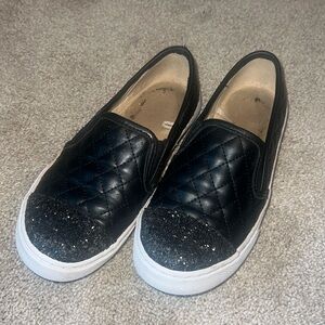 Black slip ons